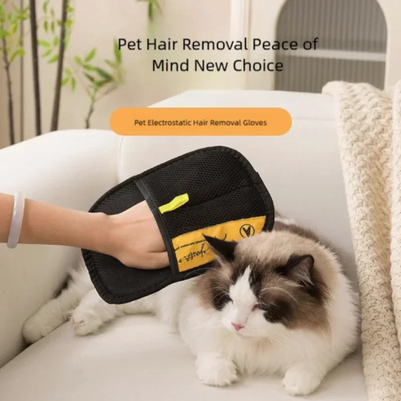 Pet deshedding glove with mesh palm, worn on a hand; black with yellow strap detail.