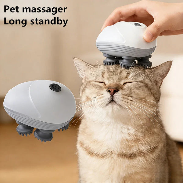 Electric pet massage comb with silver head and rotating rubber nodes, being used on a cat